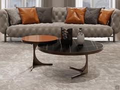 Pair of modern coffee tables Duetto with a matte noir desire ceramic top and orange lacquered glass, whose bright hue is cleverly picked up by some of the living room's decorative cushions