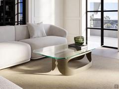 Odyssey coffee table with sheet metal base and smooth transparent glass top