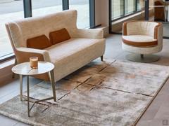 League coffee table with round Vagli Oro stone top, matching the Doyle sofa and the matching Charme armchair