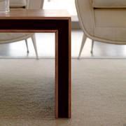 Detail of the Toki desk made of natural walnut wood and wenge veneer inserts