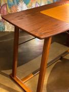 Close up of the Saul writing desk with solid-wood structure and top in oak-wood veneer