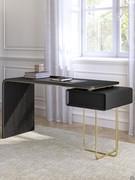 Detail of the drawer unit in the same finish of the top and with the base in golden painted metal