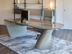 Vortex desk - the sloping side gives a sense of solidity, while the sculptural twisting base gives a feeling of movement