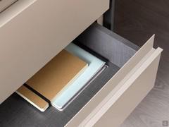 View of the internal side of the drawers in Oxford sand melamine