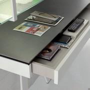 Zoom on the functional pull out drawer of the fixed console to be attached to the wall