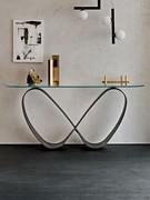 The plinth is distinguished by its distinctive stylized butterfly-shaped appearance