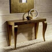 Handcrafted saber front legs for the console table Mafalda in patinated gold leaf