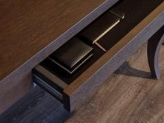 Detail of the central drawer concealed in the thickness of the console top