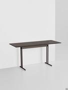 Graphic console table measuring 150 x 60 cm, with a dark wood top and Aval metal legs in burnished brown tones