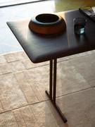 Detail of the high-quality soapstone work with bevelled profile of the solid ash wood top