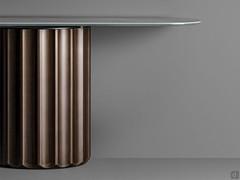 Modern console table with central base Dorian by Bonaldo with clearly visible glass plate supporting the ceramic stone top