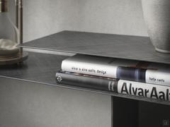 Overlapping shelves create a small open compartment ideal for books or magazines