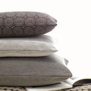 Feather cushions with fabric upholstery for sofas and beds 