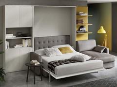 Bookcase All-in for convertible bed in two versions: on the left 6-compartment bookcase with hinged doors and open elements, on the right as boiserie with shelves to complement the Holdem sofa peninsula element