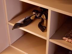 Detail of the 6-compartment cubby storage in nude matte lacquered decor