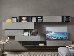 System of wall units and open compartments with color matching and staggered placement