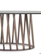 Detail of Globo table with perforated metal basket-like base