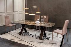 Still dining table with Emperador porcelain stoneware top and heat-treated dark oak wood veneer structure