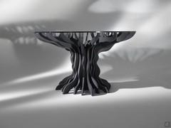 Round table with shaped base Birch in black painted version