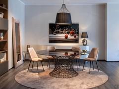 Round table Mondrian with Ø 180 cm top combined with Aurora chairs