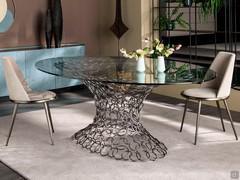 Cantori's Mondrian table with sculptural ring base and clear glass top