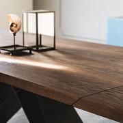 Detail of the extending table by Cattelan in burnt oak wood essence