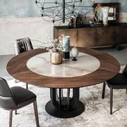 Soho by Cattelan is a round wooden table with ceramic stone insert set in the middle of the top, also available entirely made of canaletto walnut wood essence and burnt oak in various marmor-like finishes in keramik stone