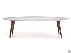 Leander elliptical dining table with top in White Carrara marble and legs in canaletto walnut