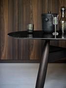 Detail of the top in Marquinia black glossy marble with bevelled edge