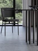 Mille table with multiple cylindrical legs with smoked glass top and gunmetal painted metal frame by Bonaldo