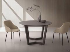 Extendable round dining table Lawrence, with a diameter of 130 cm in the normal position and 180 cm with a double central extension leaf