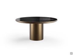 Hidalgo table with Sahara Noir polished ceramic top and vintage brushed bronze frame