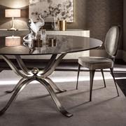 Atlante glass table with shaped iron structure by Cantori. Perfectly matched with Miss chair by Cantori.