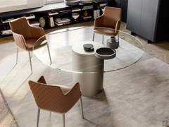 Hidalgo table in round version with transparent extra-clear glass top and Titanium painted metal base