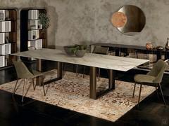 Cube table with marble-effect stoneware top, available in both the extendable and fixed versions.