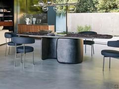 Mellow design table with central base by Bonaldo, base in lead lacquered polyurethane with brushed effect