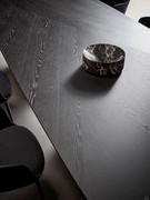 Detail of the charcoal-brushed oak wood top, one of the finishes available on Bonaldo's Mellow table tops