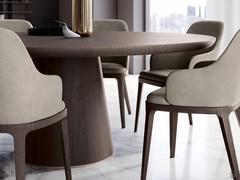 Delicate fusion of conical base and matching top, embellished with typical wood grains and shades