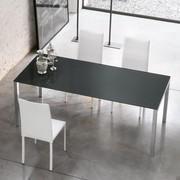 Bespoke fixed table Self with glossy anthracite opaque glass top and brill aluminum frame - legs protruding from the under-top frame