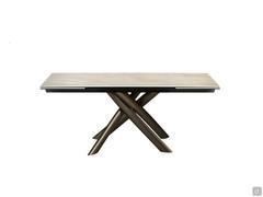 Style extendable dining table with central base - additional table leaves can be pulled out from under the table top