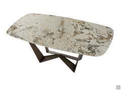 Reverse table with top in Symphony Gres stone and base in Brushed Bronze metal