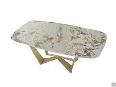 Reverse table with top in Symphony Gres stone and base in Matt Gold metal