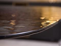 Detail of the bronze-hammered glass top