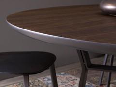 Detail of the shaped edge of the Rey dining table, also offered in lacquer to match the frame