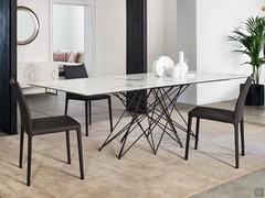 Octa rectangular table by Bonaldo with calacatta macchia vecchia ceramic top and woven base in bronze metal