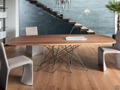 Octa table by Bonaldo with American walnut top and bronze metal base