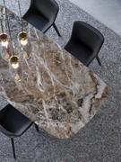 Mountain Peak ceramic stone top, one of the finishes available on the Octa table by Bonaldo