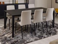 Winston extending table with matching extensions to over three metres