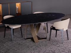 Detail of the 230 x 130 cm elliptical top made of Nero Marquinia marble