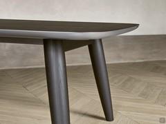 Cardinal shaped table with solid ash legs, detail of lacquered edge and undercounter.